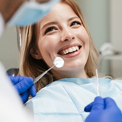 Woman smiling at dental checkup and cleaning