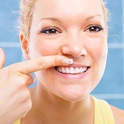 Woman looking at gums