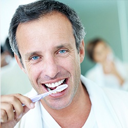 Man brushing teeth