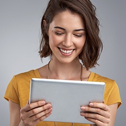 Woman looking at tablet computer