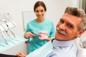 Smiling man in the dental chair