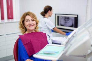 Woman smiling during her dental checkup