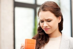 woman with a bitter taste in her mouth